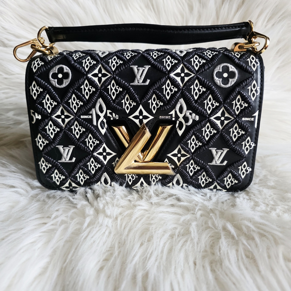 Lupis Vuitton Twist
